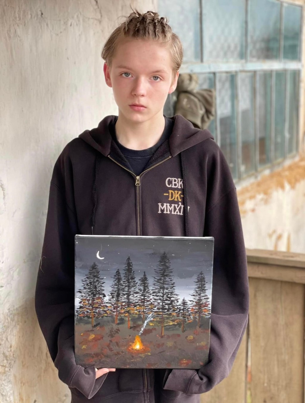 3/24/2023 – A young painter, a spot-on image of&nbsp;Ukraine