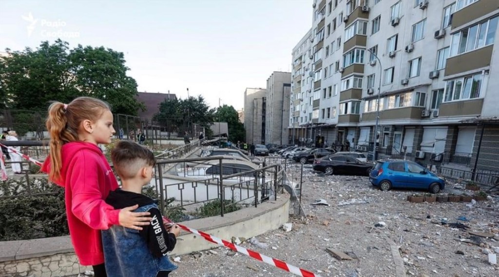 5/31/2023 – “The 6-year-old boy asks, “How did we survive it?” – “I don’t know,” is the response of an 8-year-old&nbsp;girl…”